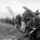Royal Marine Commandos attached to 3rd Infantry Division move inland from Sword Beach, in the early morning of June 6,1944.