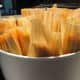 Two dozen tamales lined up in the insert