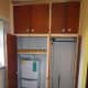 Left hand side; original airing cupboard housing the combi-boiler for the central heating; and on the right, the wardrobe emptied and ready to dismantle to make the alterations.