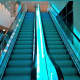 Escalators to the covered bridge from the hotel.
