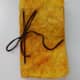 Notebook with turmeric stain.