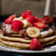 pancakes with peanut butter and fruits