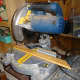 Using the bench mitre saw to cut the facings to size.