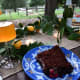 The chocolate cake looked beautiful on the blue plate.
