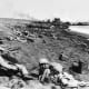 The Japanese forces on Iwo Jima would hold their fire until the beaches were crammed full of targets. Soon after the defenders opened up on the Marines on the beaches it became a killing field. The only way to survive was get off the beach.