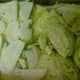 Layering onions over the cabbage
