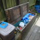 Stage two of maintaining the compost bin lid; replacing the old lid support struts with new, longer ones, made from salvaged decking.