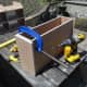 Using the middle divider as a spacer; clamping, gluing and screwing the sides to the top and bottom.