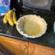 Step 4: Press the dough into the pie pan.