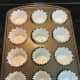 In the meantime, line a standard-sized muffin tray with baking papers.