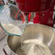 Make the pastry dough: In a stand mixer with the hook attachment, combine the flour, sugar, yeast, water, and milk. Beat on low speed to blend, then add the salt.