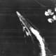 A B-17 attack misses Hiryū; this was taken between 08:00–08:30. A Shotai of three Zeros is lined up near the bridge. This was one of several combat air patrols launched during the day