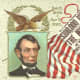 Old postcard with portrait of Lincoln and reward poster for his killer