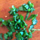 Chop the basil leaves.
