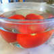 Drop the tomatoes in boiling water for 1 minute to help peeling