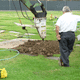 The dirt is being leveled here in preparation for replacing the sod.
