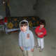 Here are my sons exploring the old family house. In the past this would have been a thriving family home, full of noise and activity, with rugs on the floor, food cooking, semolina being refined into couscous. The interior is now reduced to the essen