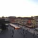 Piazza Bra is right below the Arena. This is the view of the Holiday market at sunset from above the Arena. Verona, Italy 