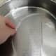 A quick 10-15 second soak will do. Soak it too long and it will get soggy and mushy making it hard to work on