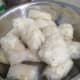 Assemble your tofu bombs on a plate while getting your oil hot to fry them. Make sure to oil the plate first to prevent the tofu bombs from sticking onto the plate