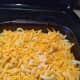 Layer the pasta and cheeses in an ovenproof dish.