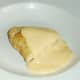 Apple and pineapple turnover with custard