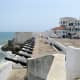 Cape Coast Castle in current-day Ghana was originally constructed as a Portuguese trading post in 1555 and was expanded into a fort by the Swedish Africa Company.