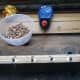 Applying glue to the holes and edge in the second oak strip