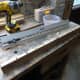 First oak strip laid out with the holes drilled and ready to glue the dowels in place