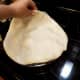 Step 6: Cut up the 2 TB butter and put it on top the the berries.  Unroll the second pie crust and put it on top.