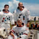 The crew for the Apollo 17 lunar landing mission are: Commander, Eugene A. Cernan (seated), Command Module pilot Ronald E. Evans (standing on right), and Lunar Module pilot, Harrison H. Schmitt.