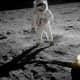 Astronaut Buzz Aldrin, lunar module pilot, stands on the surface of the moon near the leg of the lunar module, Eagle, during the Apollo 11 moonwalk. Astronaut Neil Armstrong, mission commander, took this photograph with a 70mm lunar surface camera.