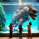 Prompt was &quot;Ripley's Aquarium, people looking at baby Godzilla in aquarium.&quot;