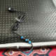 The power cable has been connected to the mat's input connector