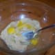 Add two eggs to the butter and sugar batter.