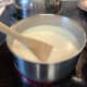 Add milk slowly, stirring constantly to prevent a lumpy sauce.