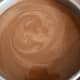 Your batter will look thin. If you're using good cocoa powder, the batter might look reflective.