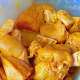 Prepare the chicken: In a large bowl, marinate the chicken parts with some turmeric powder and salt. 