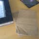 I removed the back, glass, and thin cardboard slip from the frame and cut out two cardboard pieces.