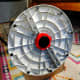 The red retainer ring has been replaced, holding the base firmly in position