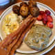 Pairing options: eggs, bacon, potatoes, and strawberries.