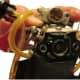 Remove the carburetor and the old gaskets.