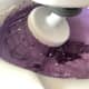 Add the ube halaya to the double cream and coconut cream mixture.
