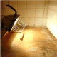 Dry old water stains. Make sure to seal the sink well when you install it to prevent this from happening again.