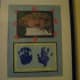Take a photo of your child and make hand prints using finger paint for this homemade gift.