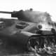 A German soldier inspects a T-34 tank knocked out at Pokrovka while it is still smoldering. Pokrovka is 40 kilometers (25 mi) southwest of Prokhorovka