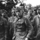 SS Hitlerjugend troops taken prisoner in Normandy 1944. They were bombarded with Nazis political indoctrination growing up under Adolf Hitler's rule.