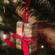 A box-shaped ornament made from a twenty-dollar bill 