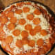 Place a final layer of pepperoni on top.