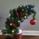 Hang your ornament at the top of your tree.